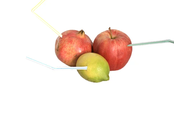 Лимон, яблоко и гранат — стоковое фото