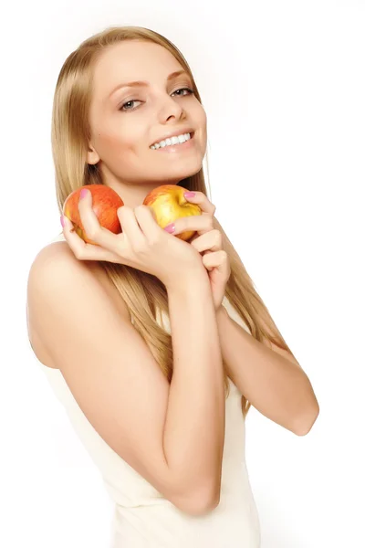 Krásná mladá blondýna s jablky — Stock fotografie