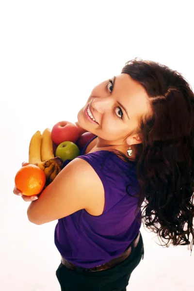 Giovane bella ragazza con frutta — Foto Stock