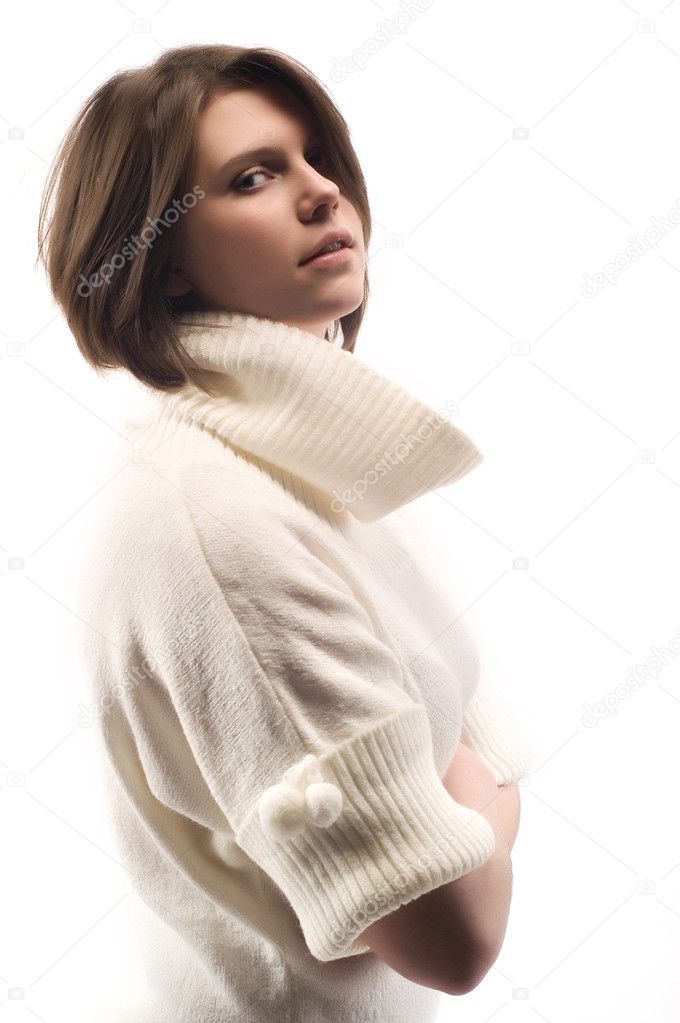 Beautiful young girl in a sweater — Stock Photo © thandra 1017433