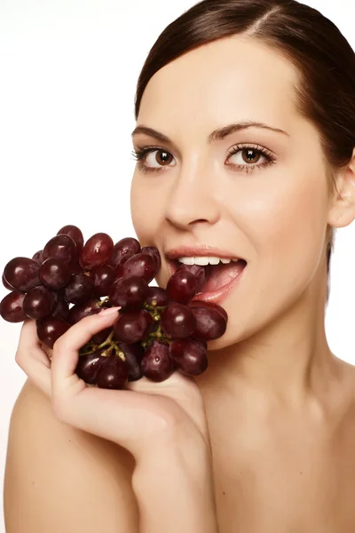 Hermosa joven con uva —  Fotos de Stock