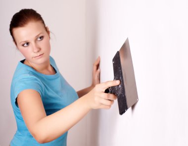 Female make repairs in the apartment clipart