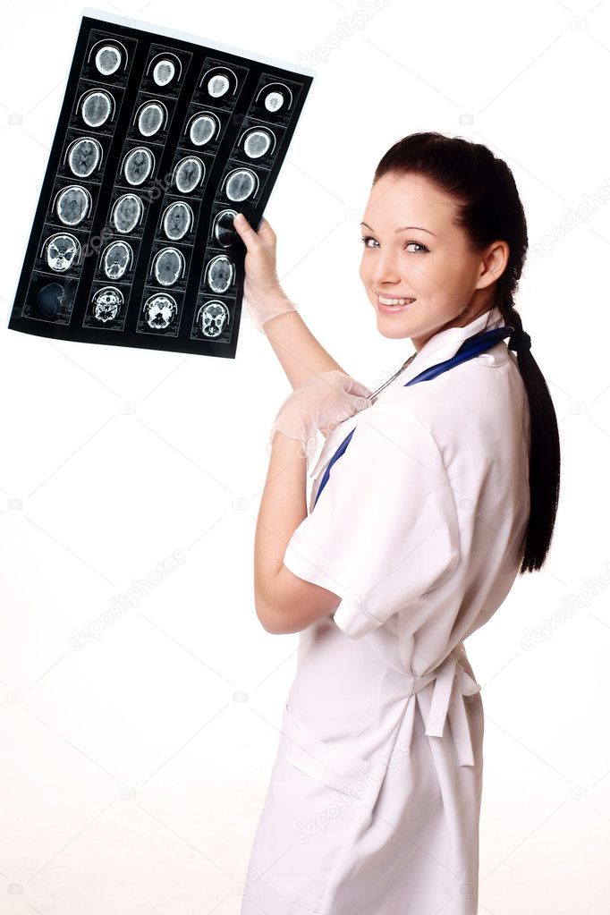 Woman doctor with x-rays of brain