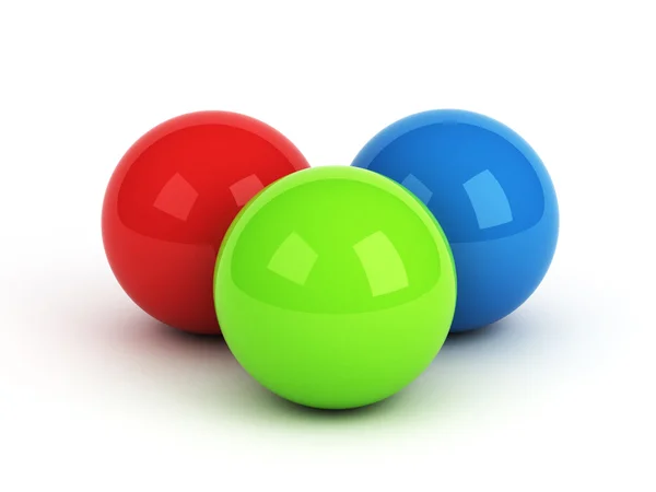 Bright red green blue spheres over white — Stock Photo, Image