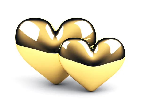 Beyaz zemin üzerine iki altın Kalpler — Stok fotoğraf