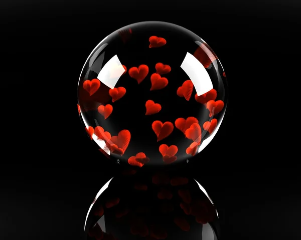 Esfera de vidro cheia de corações no preto — Fotografia de Stock