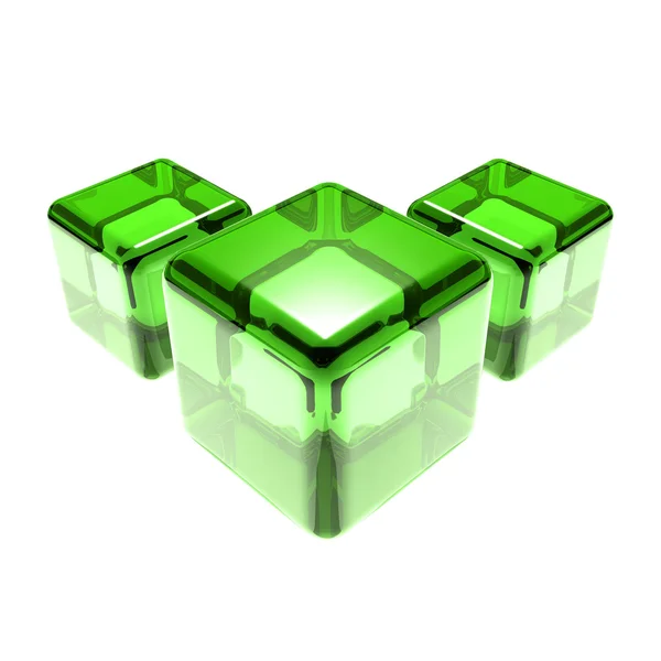 Geïsoleerd drie groene glazen kubussen — Stockfoto
