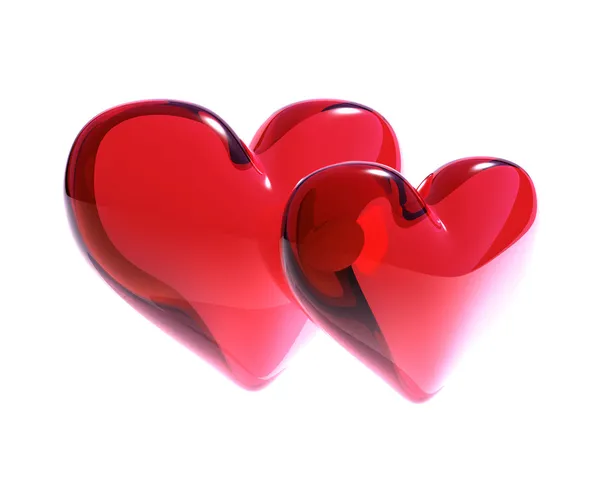 Dois corações de vidro vermelho isolados — Fotografia de Stock