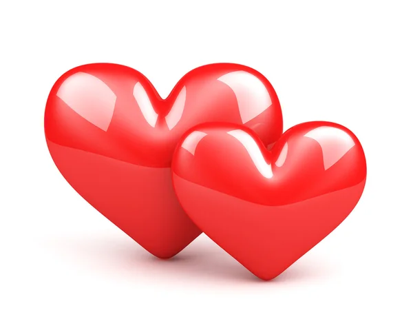 Dvě červená srdce na bílém pozadí — Stock fotografie