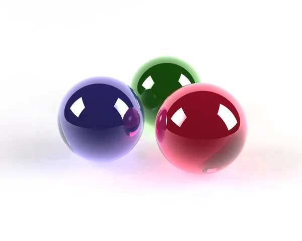 Três esferas coloridas de vidro — Fotografia de Stock