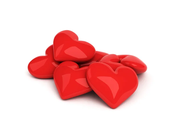 Beyaz zemin üzerinde yedi kırmızı Kalpler — Stok fotoğraf