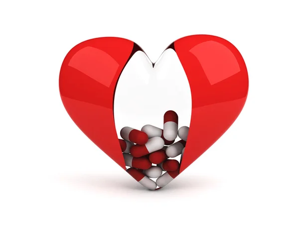 Coração transparente com pílulas dentro — Fotografia de Stock