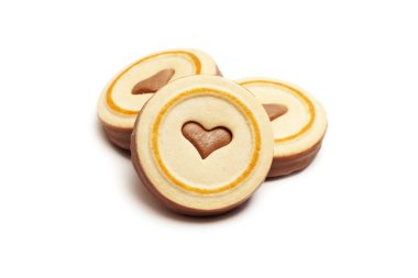 Chocolate cookies with heart over white clipart