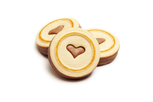 stock image Chocolate cookies with heart over white