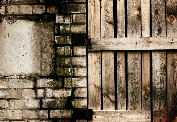 Oude grungy baksteen en houten textuur — Stockfoto