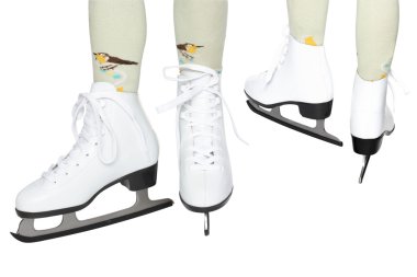 Skates on the child's legs clipart