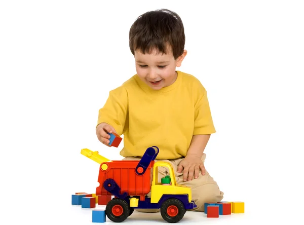 Chlapec, kamionu a bloky Stock Obrázky