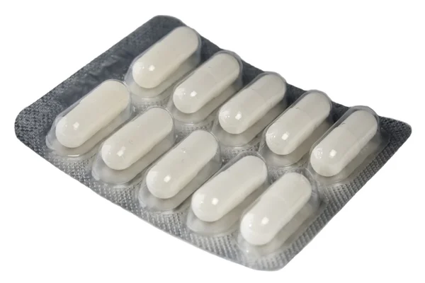 Folie pakket van witte pillen — Stockfoto