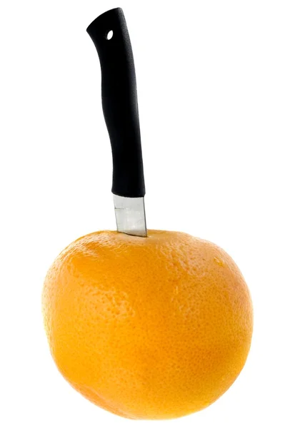Grapefruit with knife — Stock Photo, Image
