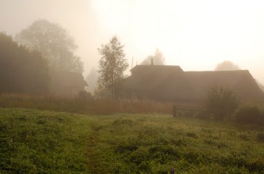 Foggy Sunrise In The Russian Village clipart