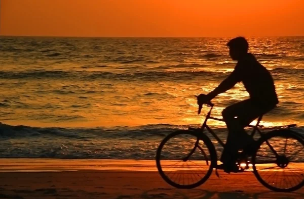 stock image Cycling At Sunset On The Beach