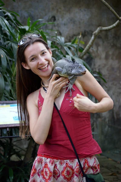 Portrait photo of girl with iguana Royalty Free Stock Images