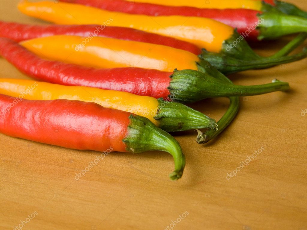 Red and yellow chili peppers — Stock Photo © AGphoto 1077221