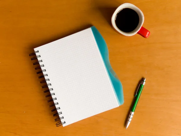 Φλιτζάνι καφέ και το σημειωματάριο — Φωτογραφία Αρχείου