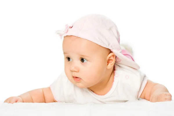 Porträtt baby flicka klädd i rosa hatt — Stockfoto