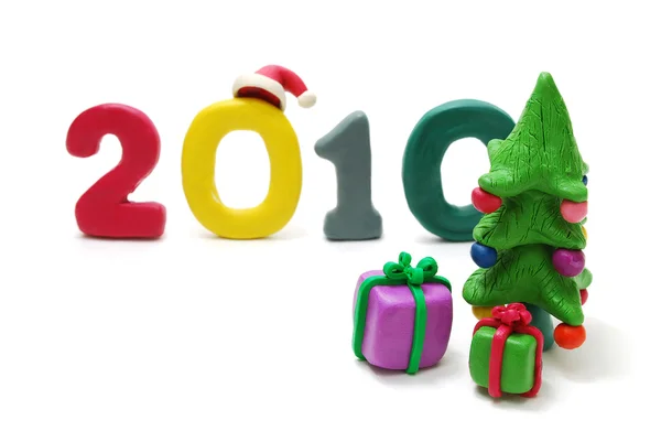 Text 2010, julgran och gåvor — Stockfoto