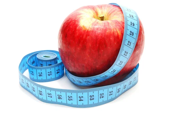 Jablko s páskou opatření — Stock fotografie