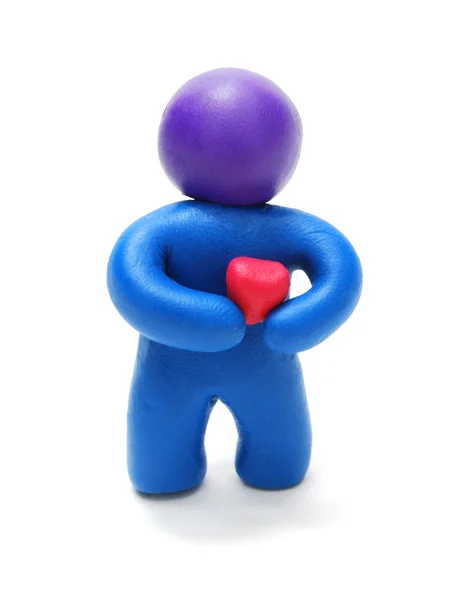 Plasticine Man Holding Heart — Stock Photo, Image