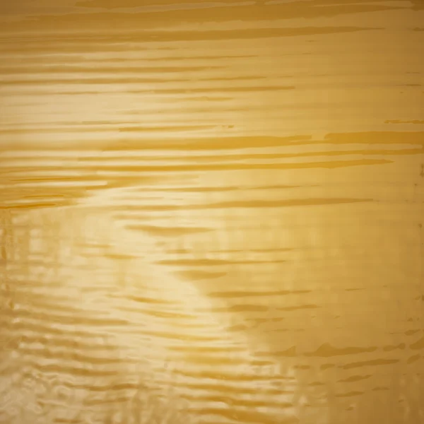 液体金黄背景 — 图库照片