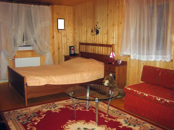 Drewniany dom w sypialni — Zdjęcie stockowe