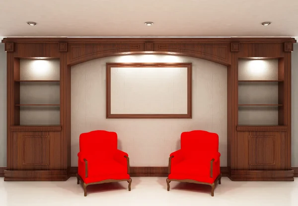 Zwei rote Stühle neben leerem Bücherregal — Stockfoto