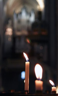 Candles in the church. clipart