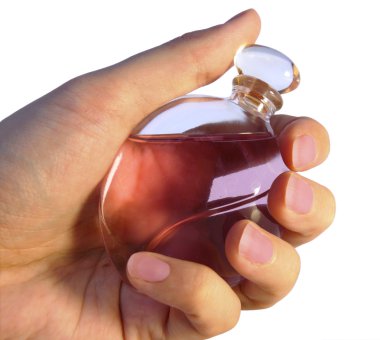 Bottle of parfume in hand clipart