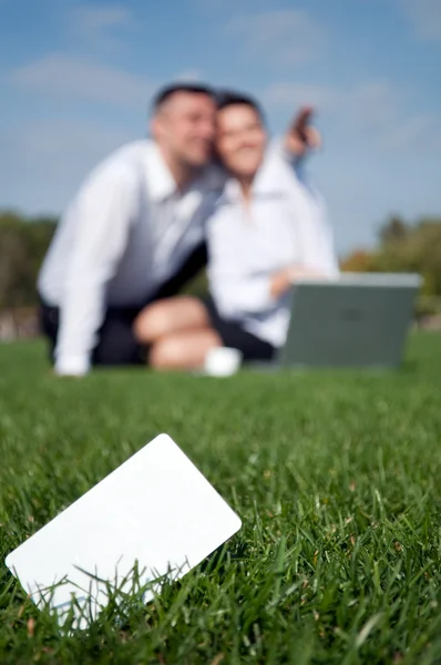 Man and woman with laptop — Stock Photo, Image