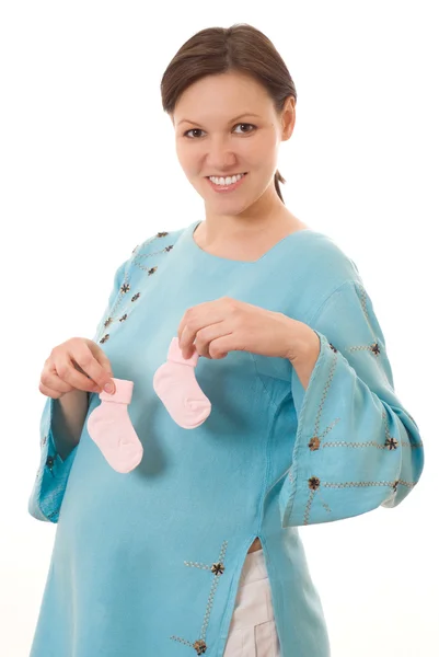 Femme enceinte souriante dans une robe bleue — Photo