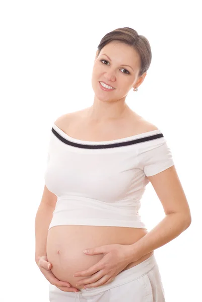 Glad gravid kvinna som står — Stockfoto