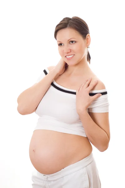 Ler gravid kvinna som står — Stockfoto
