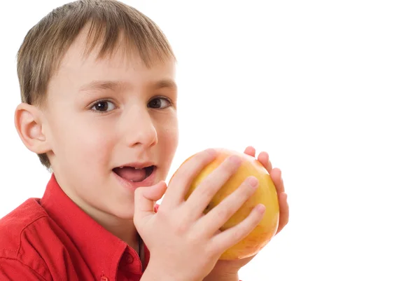 Chłopiec jest apple i otwiera usta — Zdjęcie stockowe