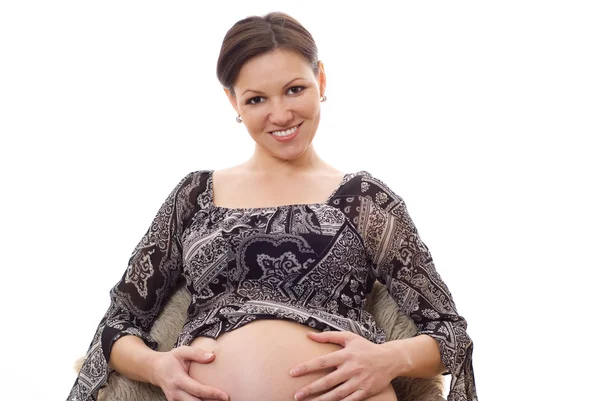 Těhotná žena úsměvy — Stock fotografie