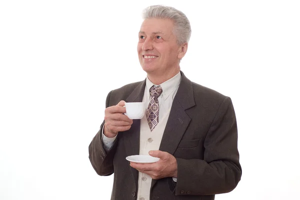 Homme d'affaires buvant dans une tasse — Photo