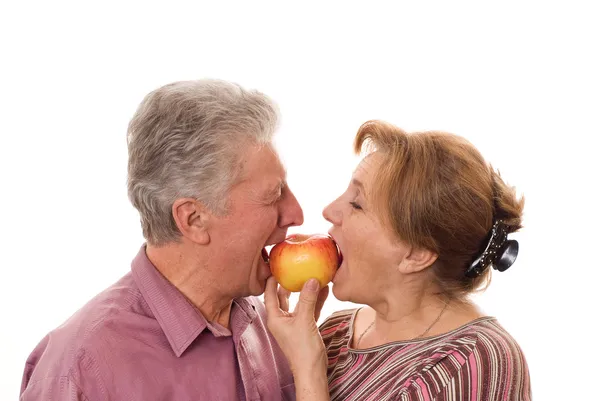 stock image Couple eating an apple