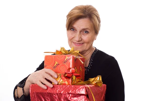 Beautiful older woman with a gift — Stock Photo, Image