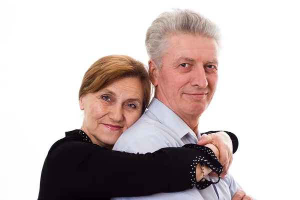Oudere vrouw knuffelen een man — Stockfoto