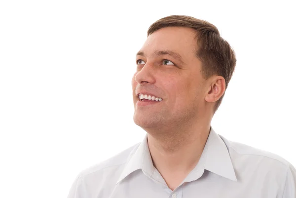 Positive man standing on a white — Stock Photo, Image