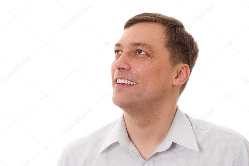 Positive man standing on a white