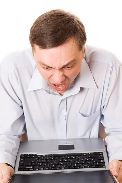 Jonge man schuld voor een laptop — Stockfoto